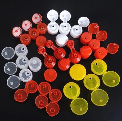 Forma wtryskowa z wieloma gniazdami i klapką do zamknięć plastikowych butelek